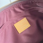 Louis Vuitton Pochette Voyage Souple M26015 in Monogram coated canvas with Boro patchwork, Damier, and Monogram Reverse canvas accents