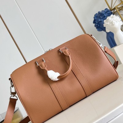 Louis Vuitton - Keepall Bandoulière 35 in Waxed Calfskin with LV Initials Embossing