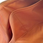 Louis Vuitton Keepall Bandoulière 35 in Waxed Calfskin with LV Initials Embossing