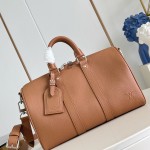 Louis Vuitton Keepall Bandoulière 35 in Waxed Calfskin with LV Initials Embossing