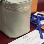 Louis Vuitton Nice Nano Cosmetic Bag in Epi Leather with Double Zip and Washable Fabric Lining
