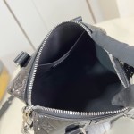 Louis Vuitton Speedy Trunk 20 Handbag in Monogram Saga Rock Style with Leather Details