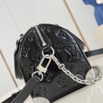 Louis Vuitton Speedy Trunk 20 Handbag in Monogram Saga Rock Style with Leather Details