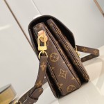 Louis Vuitton Pochette Métis Handbag with Monogram Canvas and polished S-lock closure