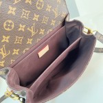 Louis Vuitton Pochette Métis Handbag with Monogram Canvas and polished S-lock closure