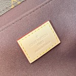 Louis Vuitton Pochette Métis Handbag with Monogram Canvas and polished S-lock closure