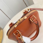 Louis Vuitton Alma BB Epi Leather Handbag with Monogram Jacquard Strap