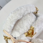 Louis Vuitton Capusnow Bag with Removable Pom-Pom Charms