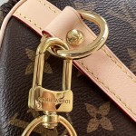Louis Vuitton Speedy Bandoulière 25 Handbag with Monogram Canvas and Leather Handle