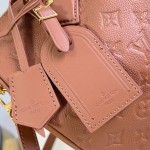 Louis Vuitton Speedy Soft 30 Handbag with Monogram Empreinte Leather and Suede Lining