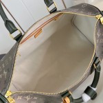 Louis Vuitton Keepall Bandoulière 50 Travel Bag with camouflage Monogram Surplus and distressed metal hardware