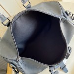 Louis Vuitton Keepall Bandoulière 45 travel bag in Monogram Midnight coated canvas with leather trim