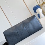 Louis Vuitton Keepall Bandoulière 45 travel bag in Monogram Midnight coated canvas with leather trim