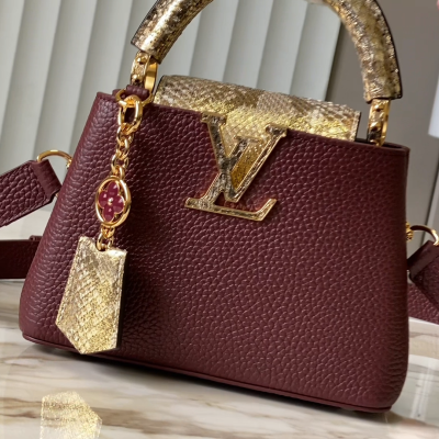 Louis Vuitton - Capucines Bag in Burgundy with Golden Snake Embellishment