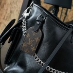 Louis Vuitton M24861 Special Edition Handbag with Copper Electronic Tag